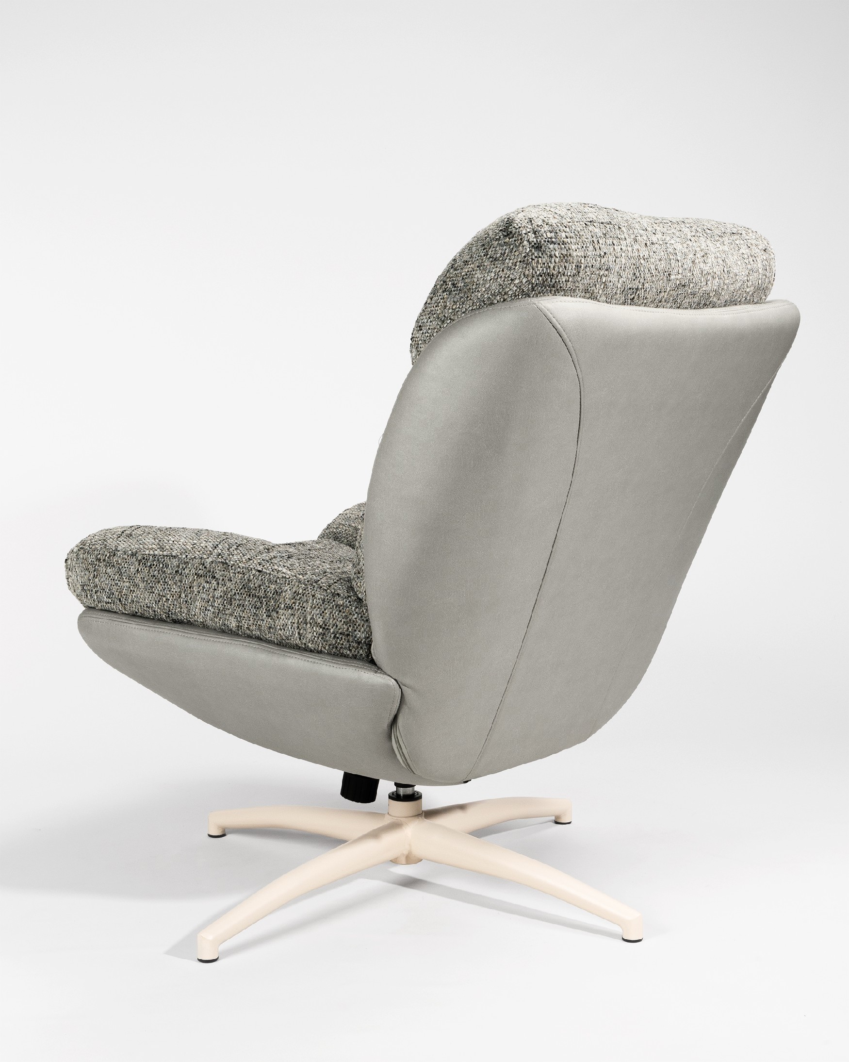 Velina armchair with gray and storm upholstery with ivory metal structure ottoman, 360° swivel rocking.