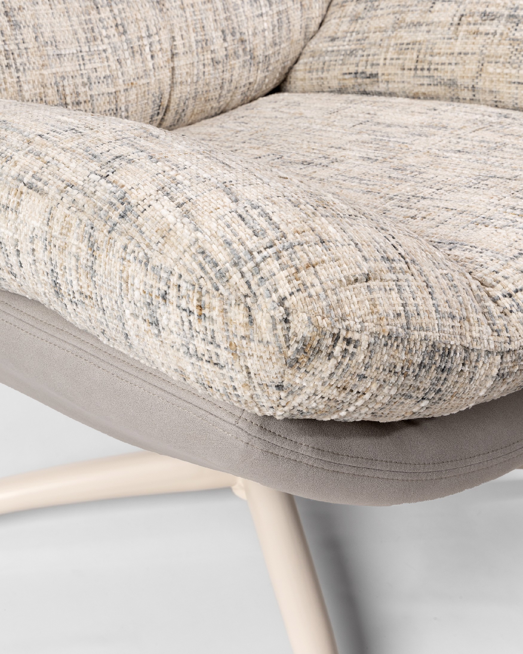Velina armchair with pearl and cloud upholstery with ivory metal structure ottoman, 360° swivel rocking.