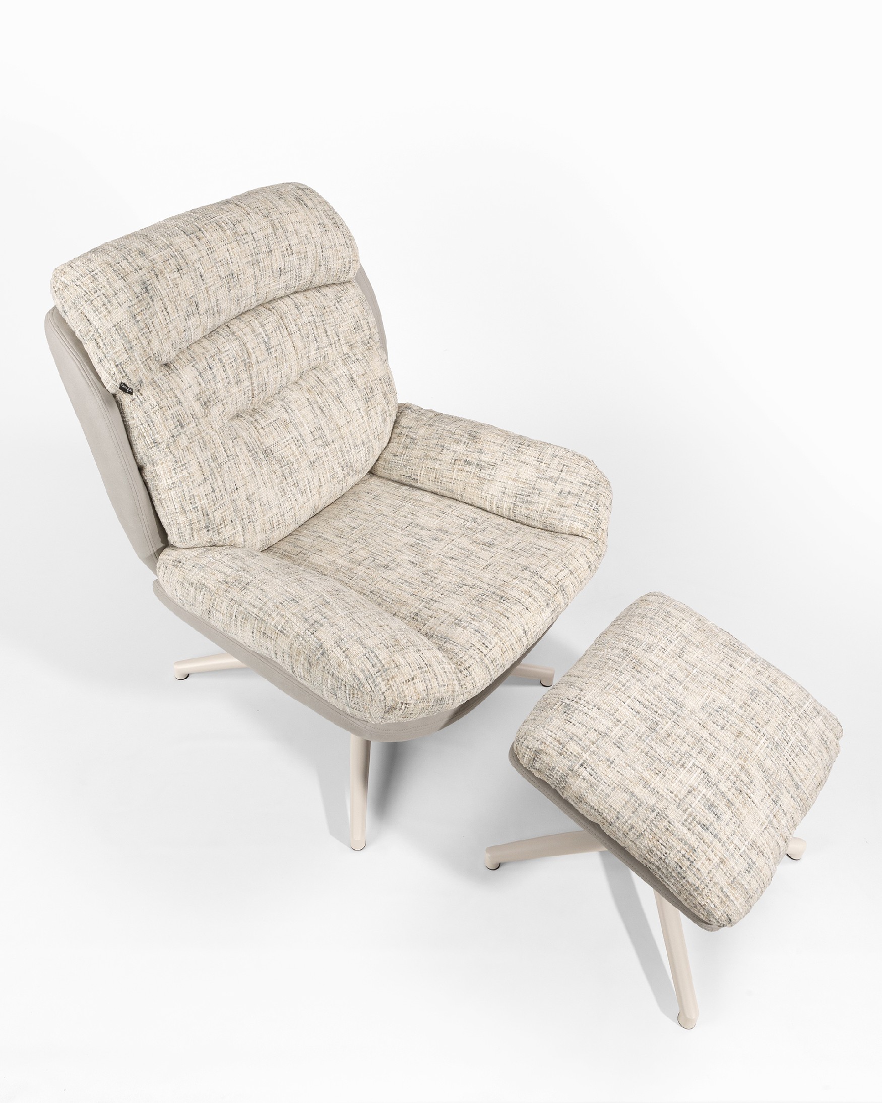 Velina armchair with pearl and cloud upholstery with ivory metal structure ottoman, 360° swivel rocking.