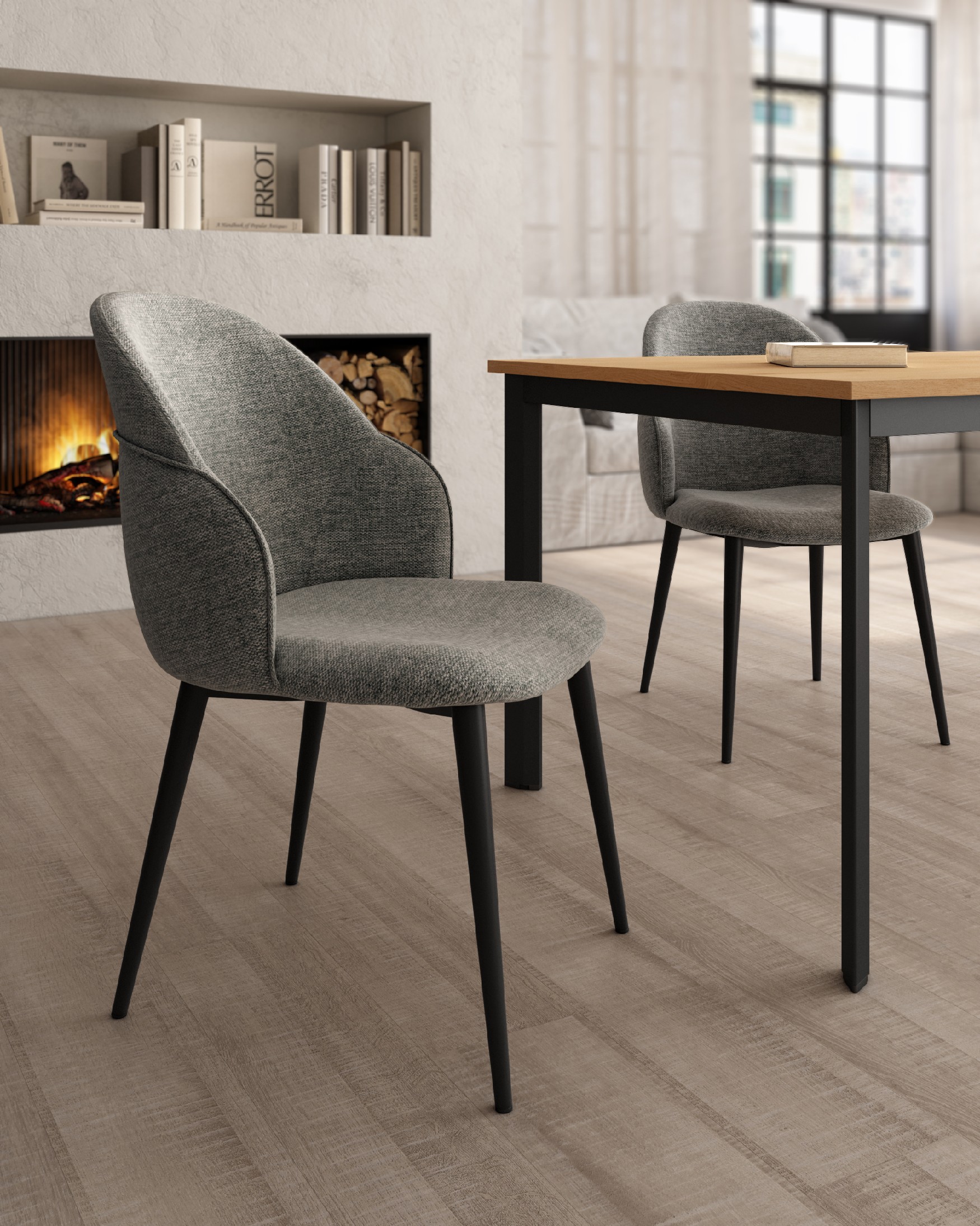 Silla Venecia con tapizado gris y patas metálicas negras