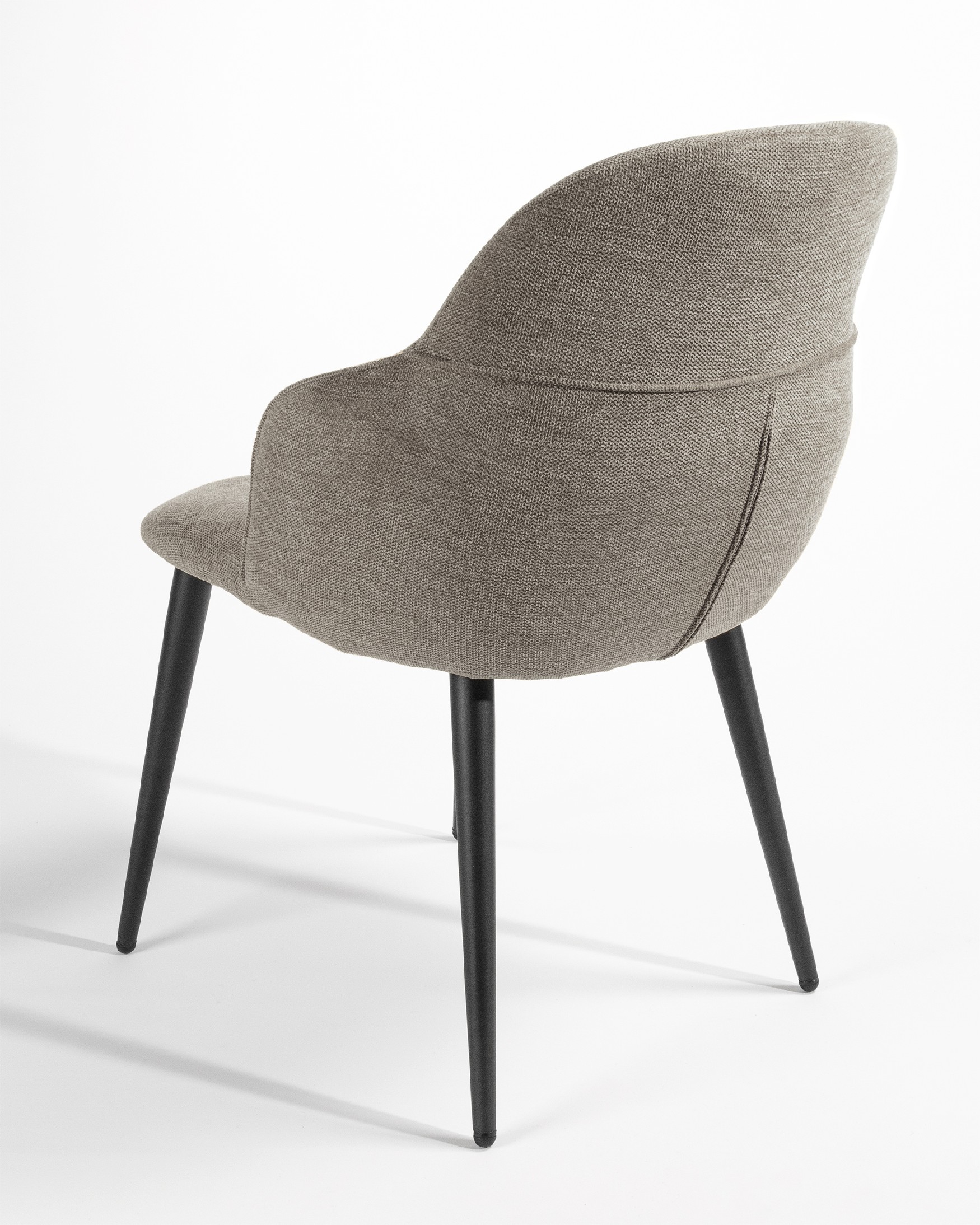Venice chair with brown upholstery and black metal legs