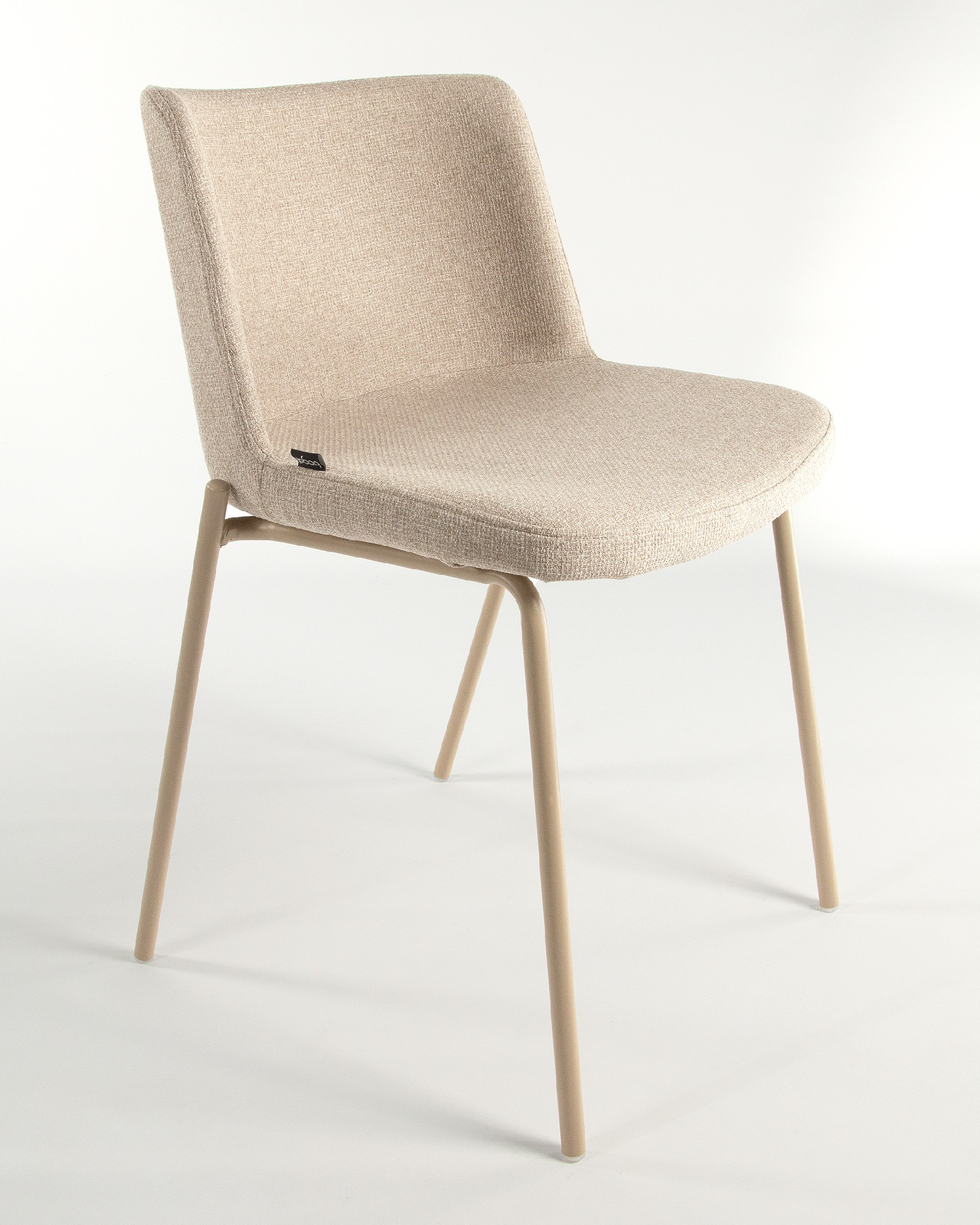 York chair with cream upholstery and matching metal legs