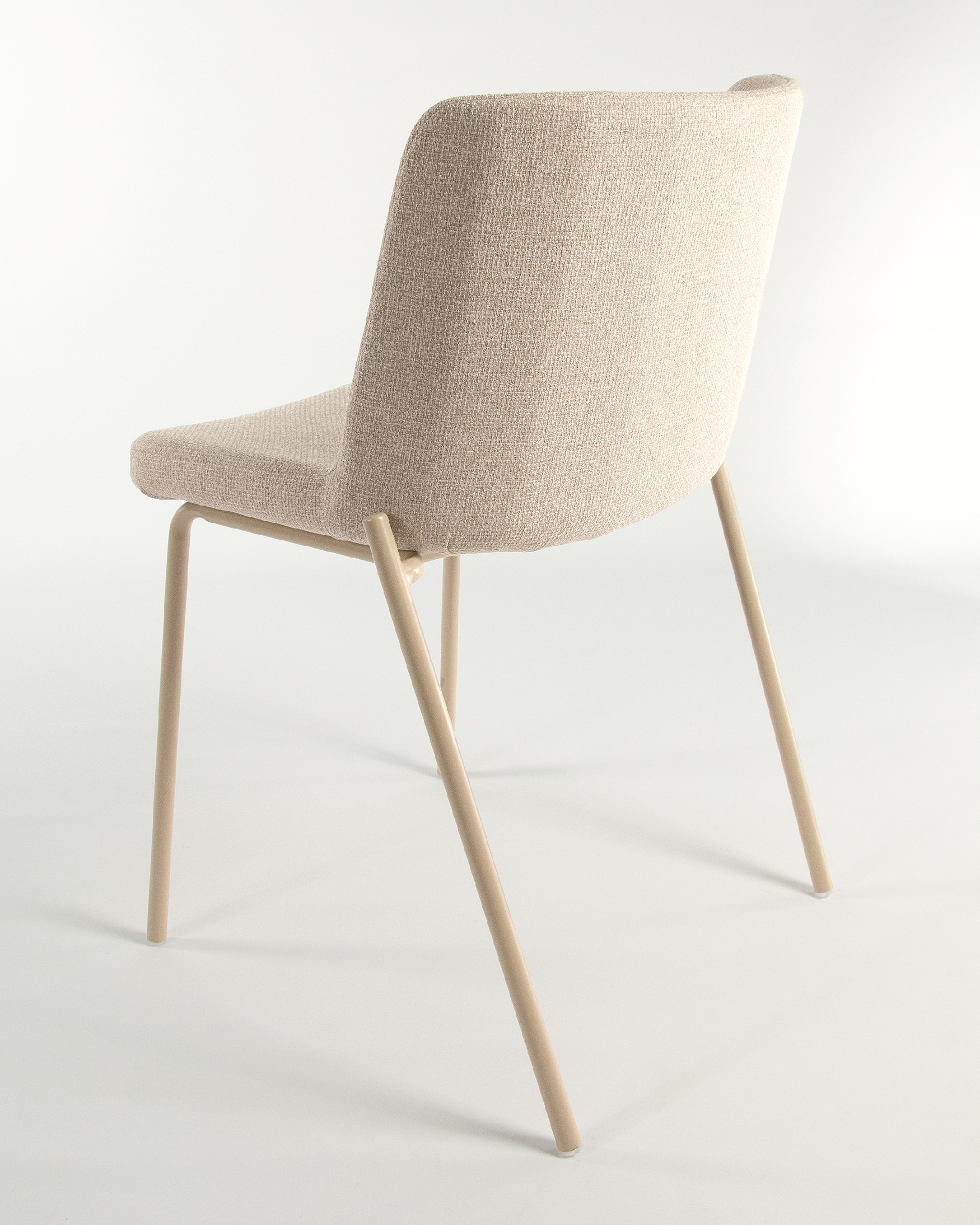 York chair with cream upholstery and matching metal legs