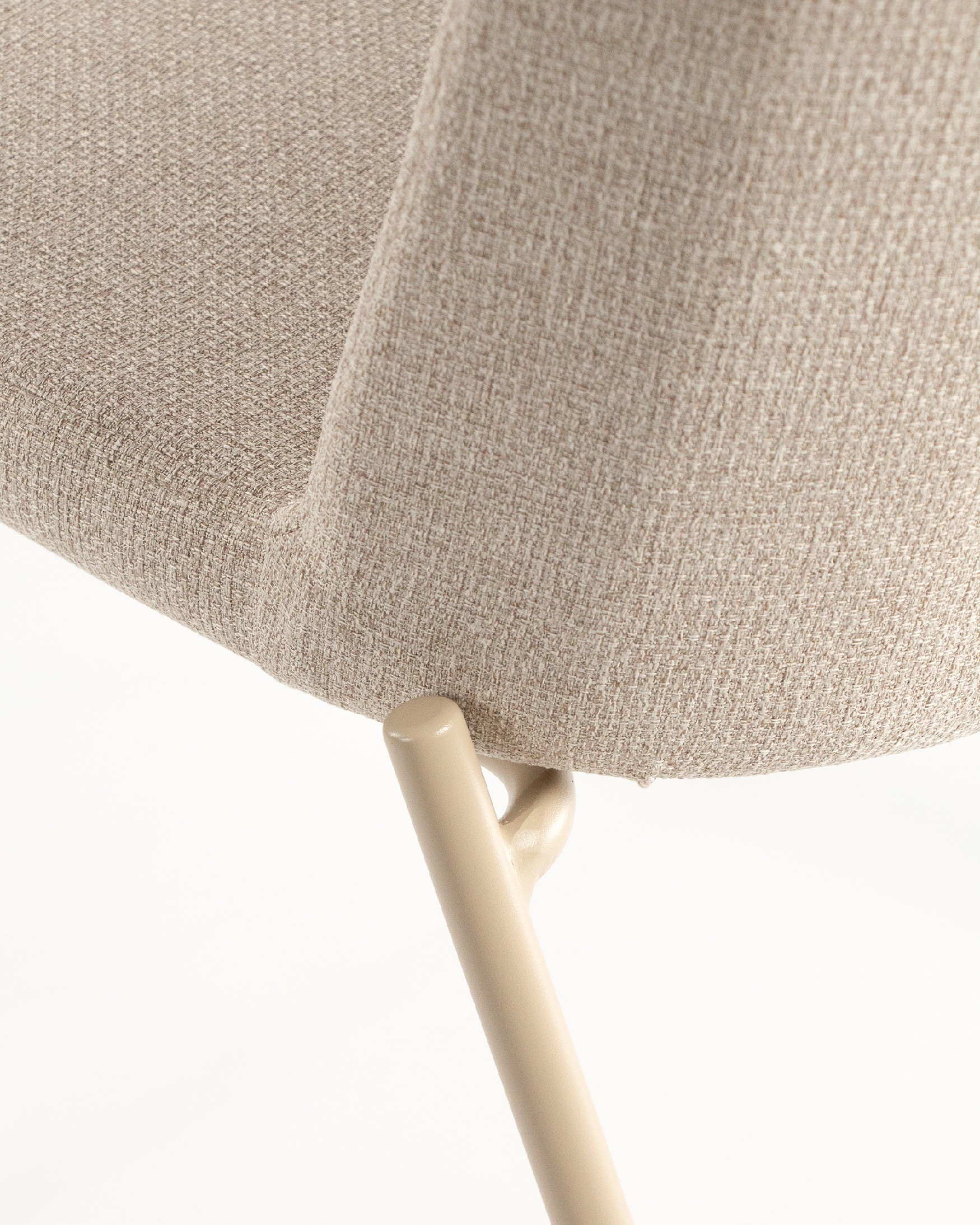 York chair with cream upholstery and matching metal legs