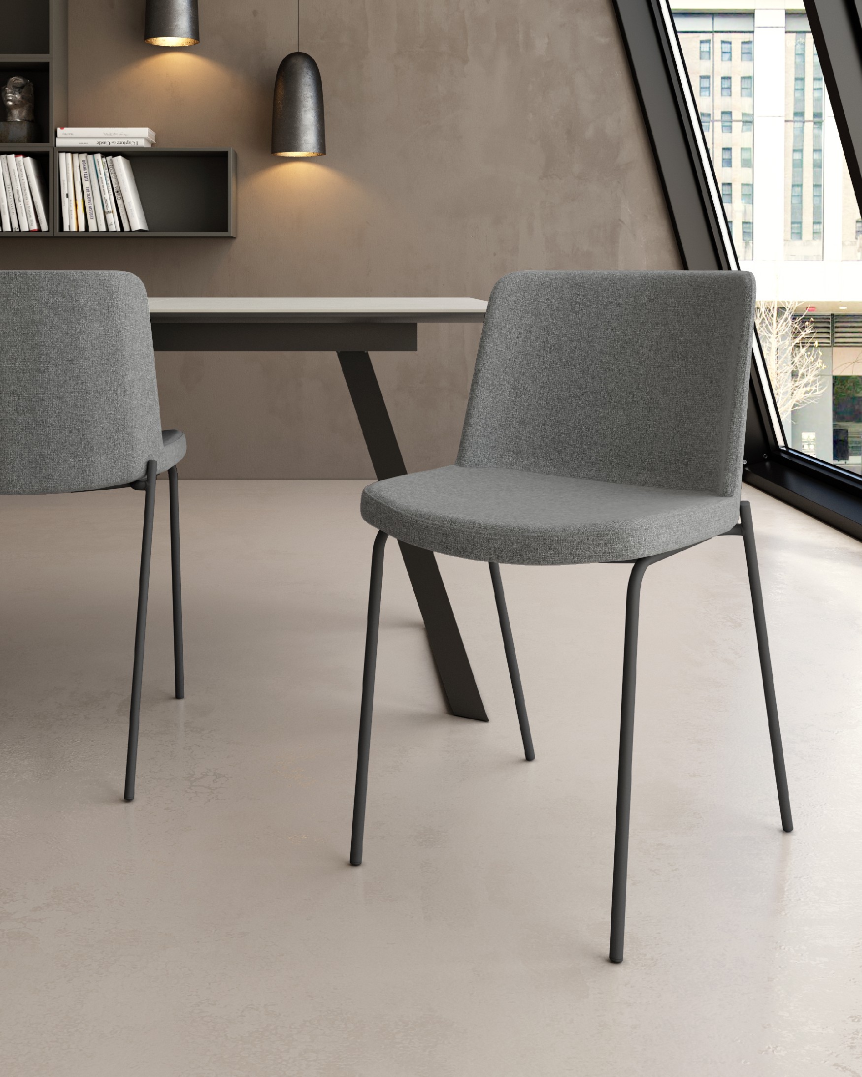 York chair with gray upholstery and matching metal legs