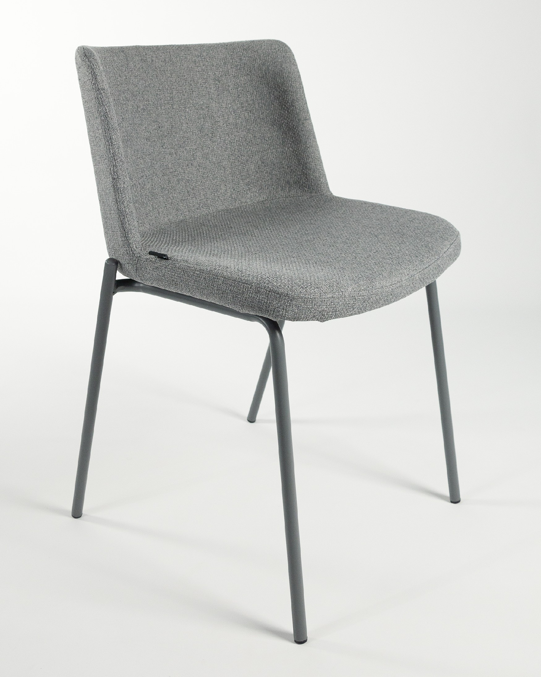 York chair with gray upholstery and matching metal legs