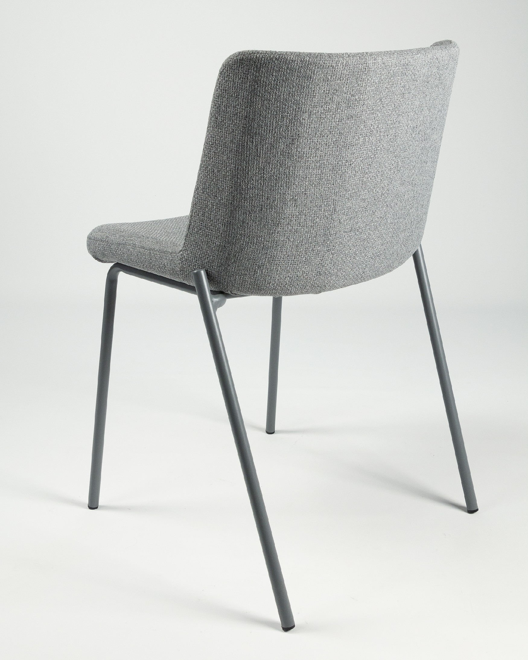 York chair with gray upholstery and matching metal legs
