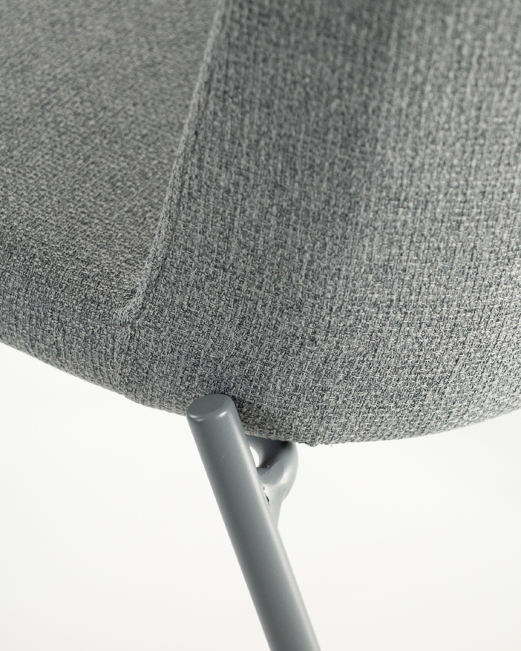 York chair with gray upholstery and matching metal legs