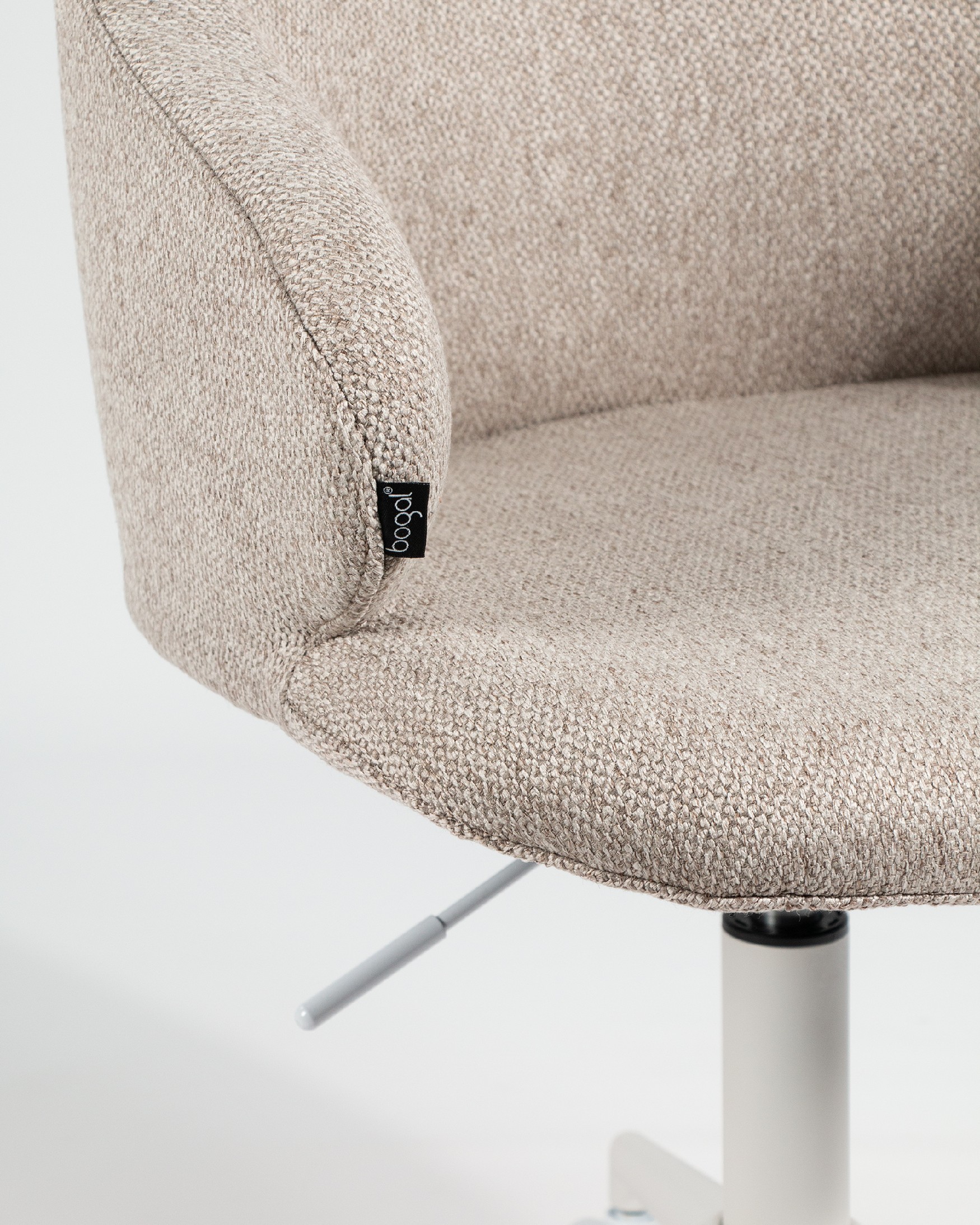 Zurich chair with brown upholstery and white metal legs