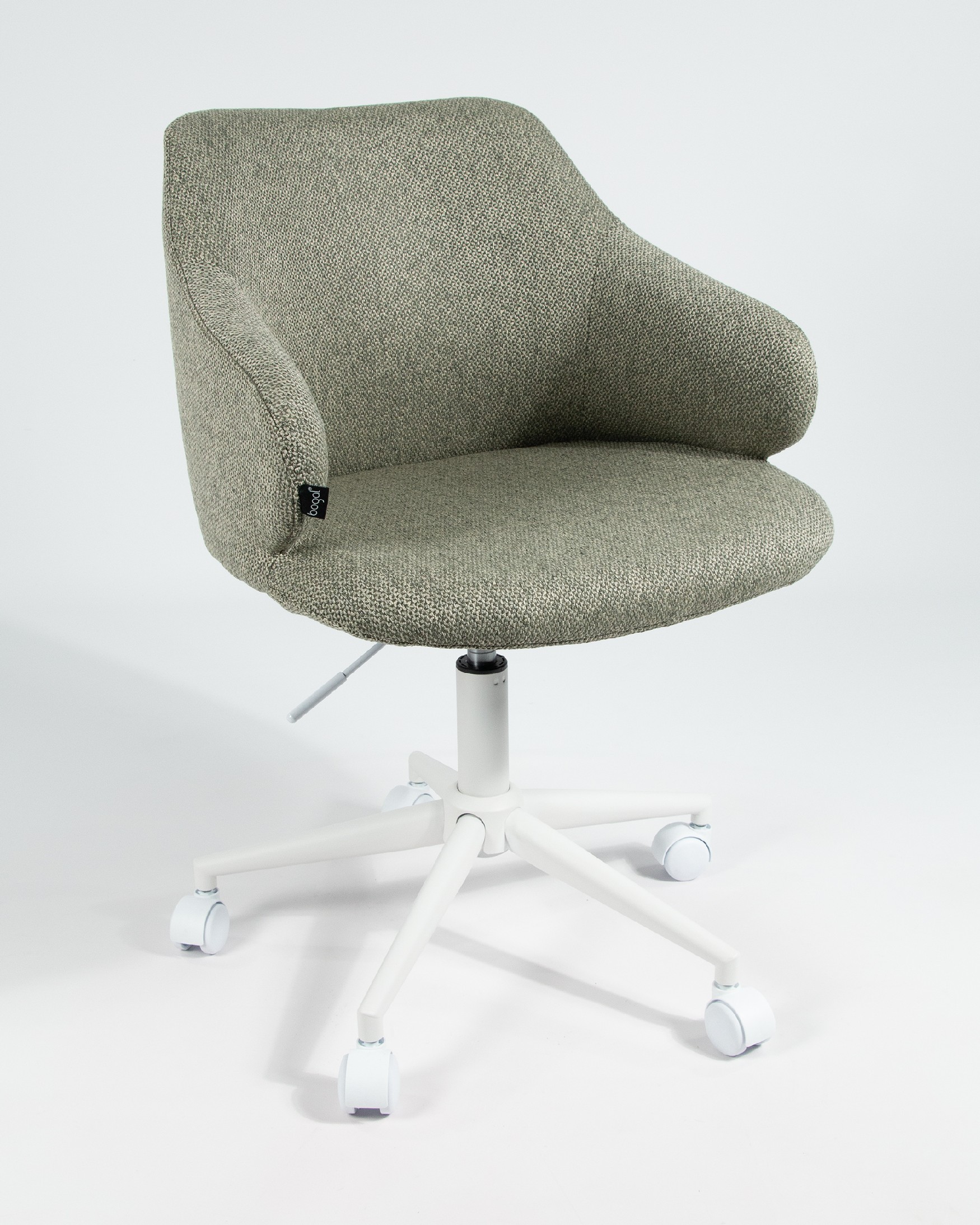 Zurich chair with green upholstery and white metal legs
